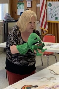 Patty using puppet to teach food safety