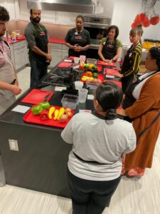 Staff learning culinary skills
