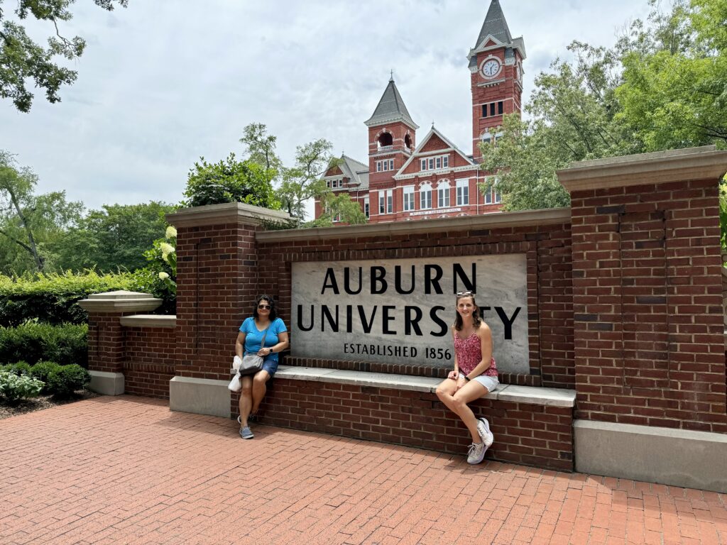 Lisa and Megan at Auburn University Sign
