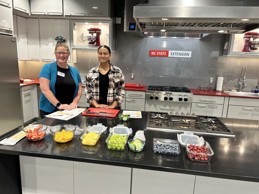 staff with colorful produce