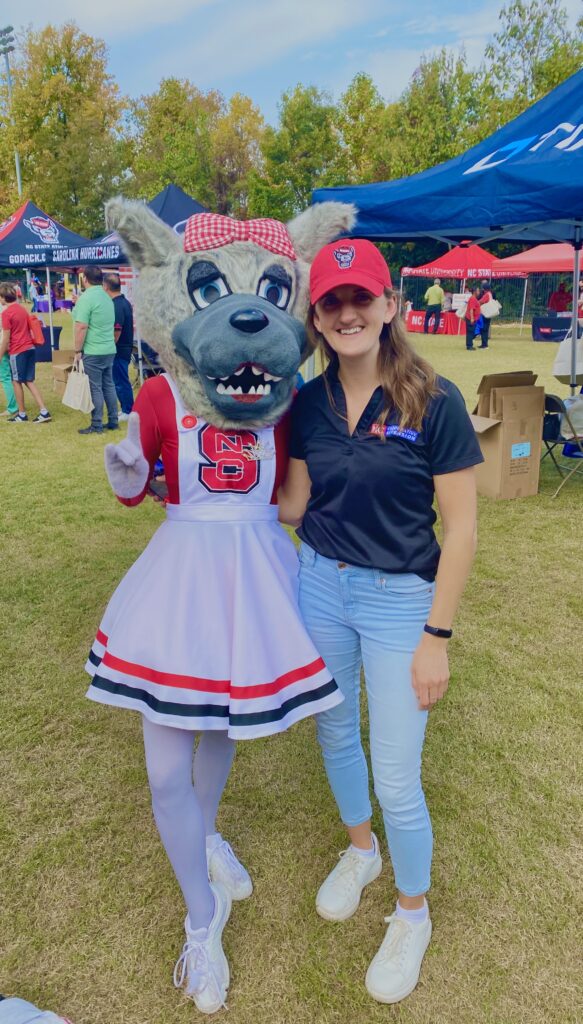 Mrs. Wuf poses at red and white week.