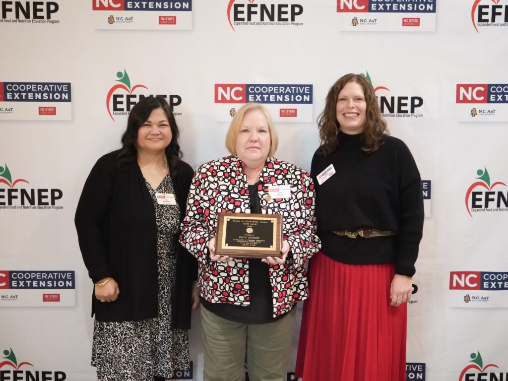 Patty Bowers with award