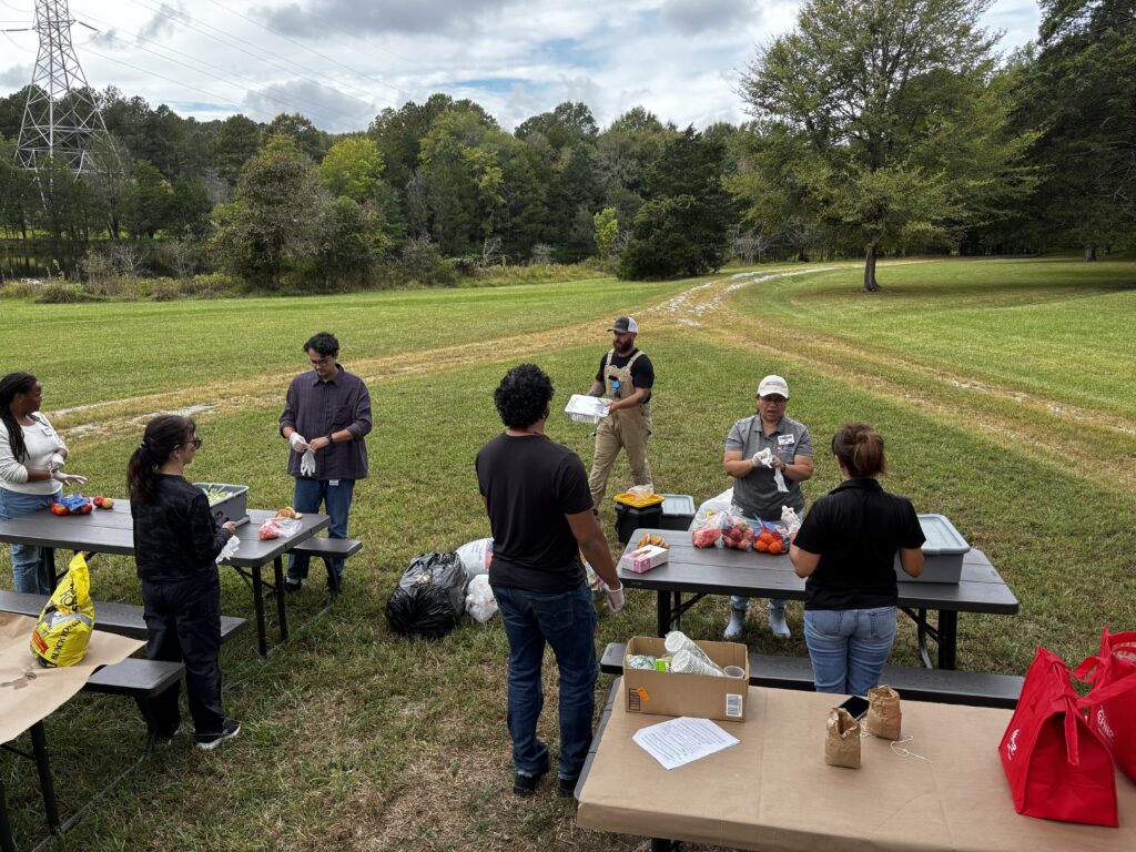 Team at farm, making compost